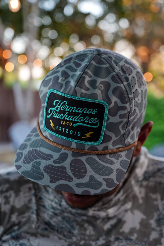 Hermanos Truchadores Hat - Teal Camo