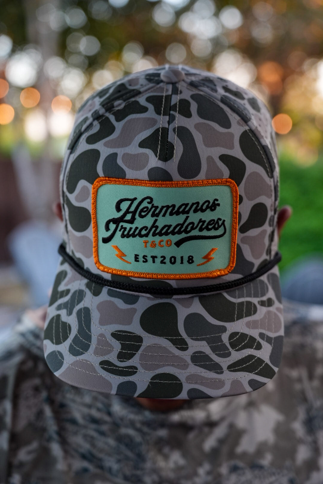 Hermanos Truchadores Hat - Grn Camo