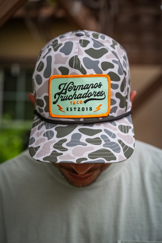 Hermanos Truchadores Hat - Grn Camo